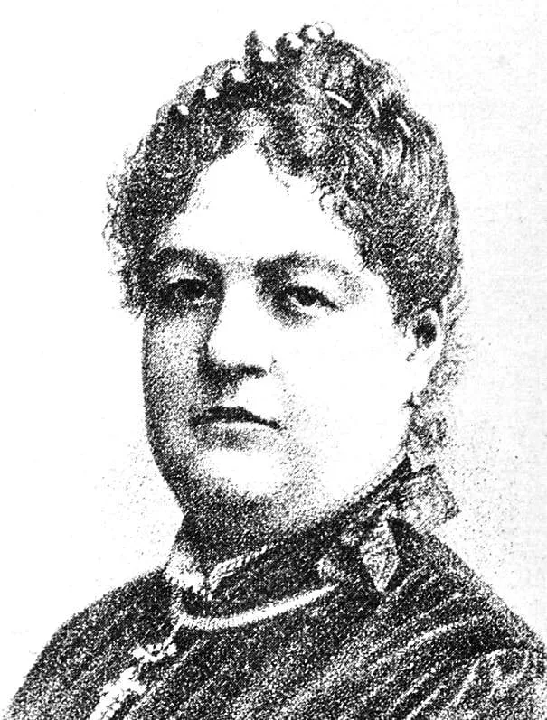 Grabado de Clorinda Matto de Turner con el cabello recogido y vestido de cuello alto